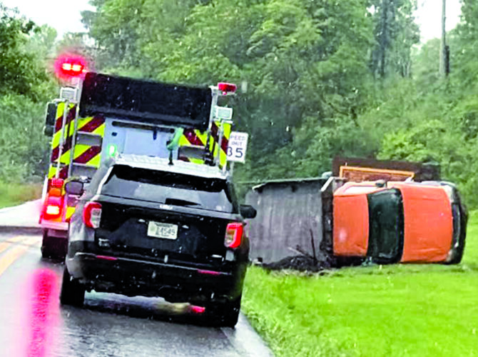 Truck Rolls Over in the Rain